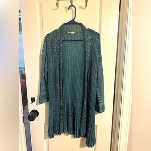 Large teal green/blue long sweater.